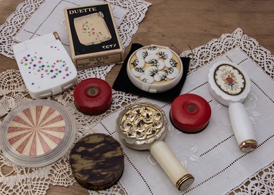 Lot 351 - Plastic Coty compacts
