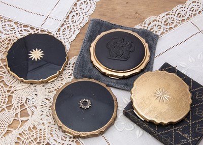 Lot 358 - Three 1950s gilt metal and black Princess Stratton compacts