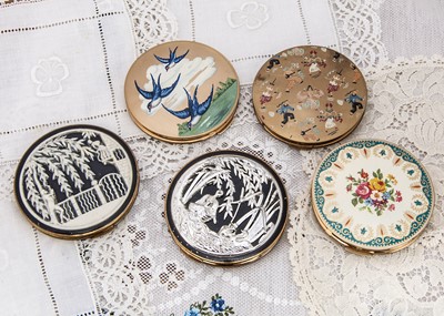 Lot 364 - Circular gilt metal Stratton compacts in the Corona or Regal style c1950s