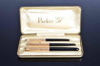 Lot 387 - A vintage cased Parker 51 triple pen set