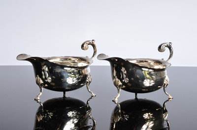 Lot 397 - A pair of modern silver sauce boats