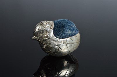 Lot 426 - An Edwardian silver cute novelty pin cushion by S. Morden & Co