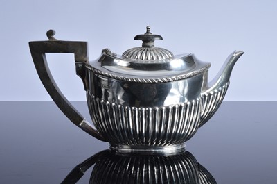 Lot 432 - A George V silver teapot from James Dixon & Son