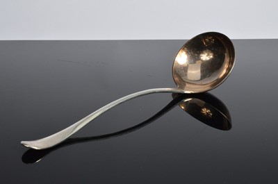 Lot 453 - An Edwardian silver soup ladle by JR