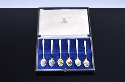 Lot 456 - A pretty set of 1970s silver gilt and enamel coffee spoons from Mappin & Webb