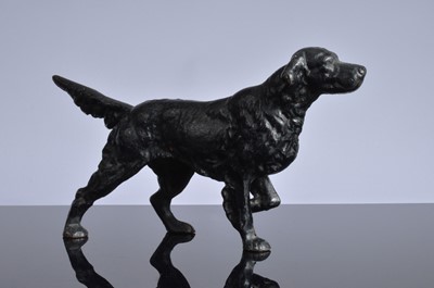 Lot 507 - An first half 20th century cast iron sculpture of a red setter dog