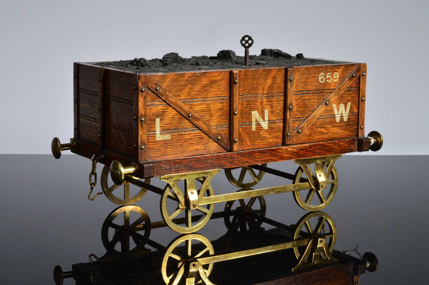 Lot 512 - An Edwardian novelty railway related cigar box