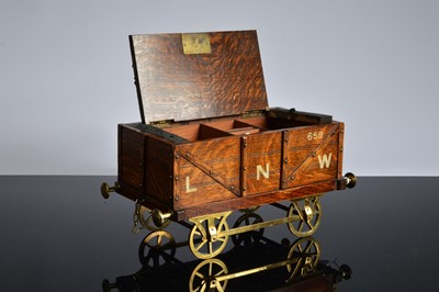Lot 512 - An Edwardian novelty railway related cigar box