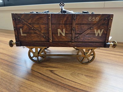 Lot 512 - An Edwardian novelty railway related cigar box