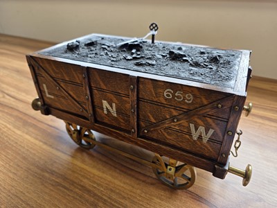 Lot 512 - An Edwardian novelty railway related cigar box