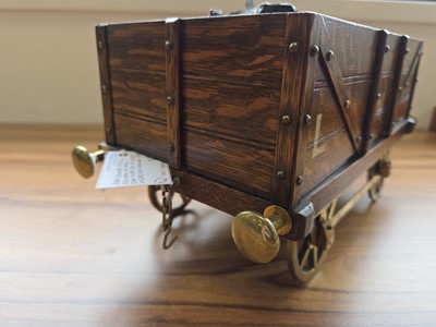 Lot 512 - An Edwardian novelty railway related cigar box