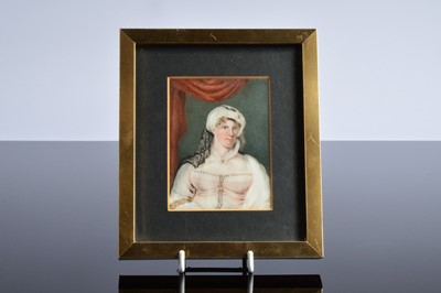 Lot 519 - A late George III period portrait miniature of a lady