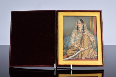Lot 522 - A fine late 19th century portrait miniature of a lady