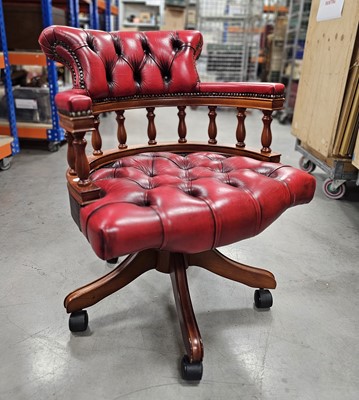 Lot 543 - A modern Captain's style office chair