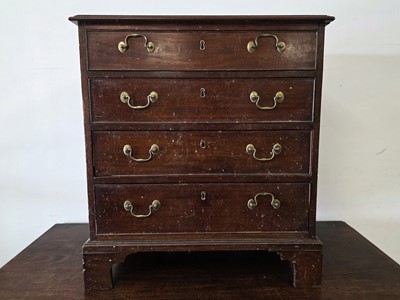 Lot 547 - A Goerge III period mahogany small chest of drawers