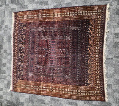 Lot 558 - A vintage Belouch style woollen carpet