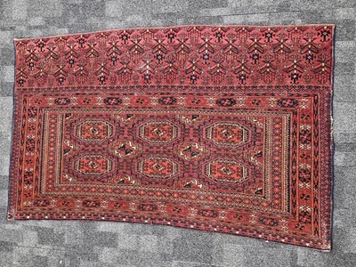 Lot 559 - A vintage Turkman Tekke Torba woollen carpet