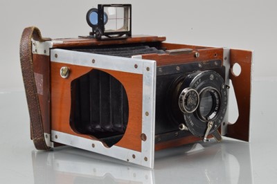 Lot 24 - A Shrew & Co Mahogany & Aluminium Xit Quarter Plate Strut Camera