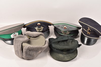 Lot 191 - A small group of Overseas Peak Caps