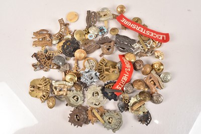 Lot 258 - An assortment of British Cap Badges and Shoulder Titles