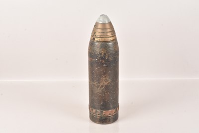 Lot 324 - A large Inert Round