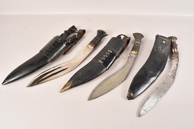 Lot 346 - A Group of three Middle Eastern Kukri Knives