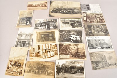 Lot 550 - Edwardian and Later Postcards Shop Fronts and Delivery Vehicles in two Modern Albums (60+)