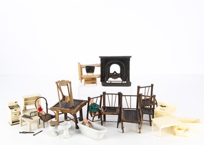 Lot 298 - A late 19th century dolls' house or sample cast-iron fireplace