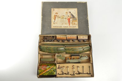 Lot 406 - Bing 00  Railway Gauge boxed Table Top LNWR clockwork Passenger Train Set