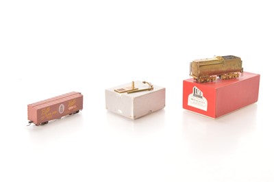 Lot 559 - Japanese unpainted Brass HO Gauge Tender and Oil Column and MDC Box Car (3)