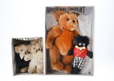 Lot 38 - A Merrythought bear with golly set