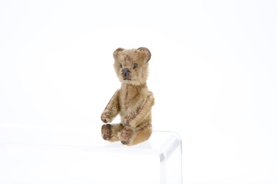 Lot 195 - A 1930s Schuco miniature perfume teddy bear