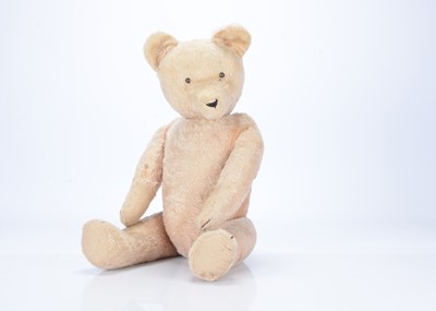 Lot 197 - A pale pink continental teddy bear