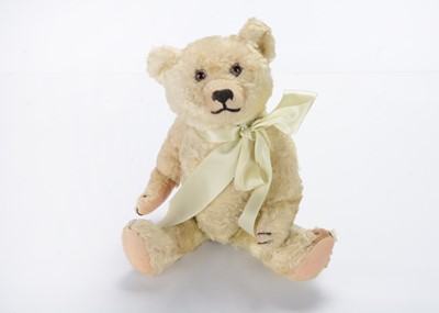 Lot 295 - A 1930s Omega (British United Toy Manufacturing Co. Ltd) pale green art silk teddy bear