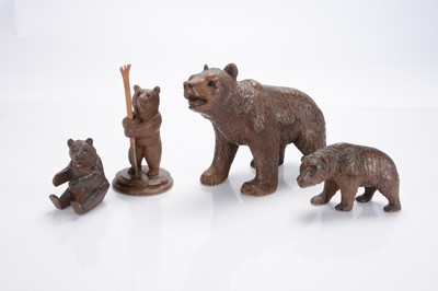 Lot 321 - A larger late 19th century Black Forest carved wooden bear