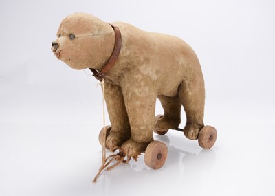 Lot 363 - A Steiff 1910/20s bear on wheels