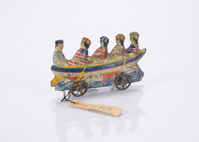 Lot 389 - A Japanese larger Penny Toy sample four-man rowing boat with H.M. & Co card tag
