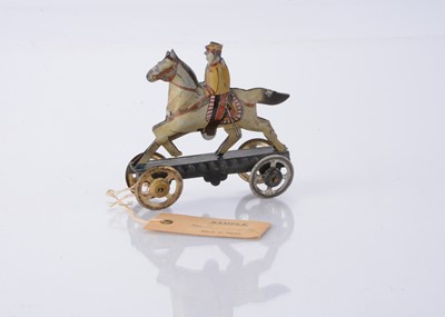 Lot 395 - A Japanese Penny Toy sample Japanese cavalry soldier with card tag