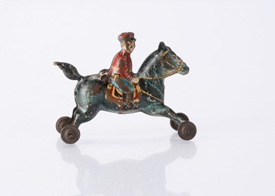 Lot 399 - A Japanese Penny Toy Japanese cavalry soldier