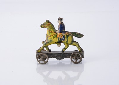 Lot 400 - A Japanese Penny Toy Japanese cavalry soldier
