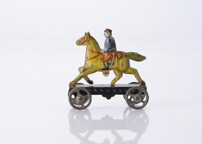 Lot 402 - A Japanese Penny Toy Japanese cavalry soldier