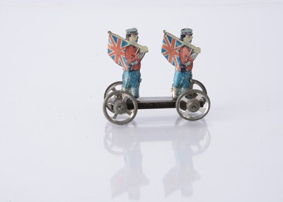 Lot 404 - A Japanese Penny Toy of two English soldiers carrying Union flags