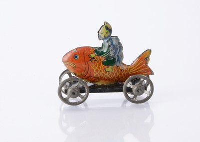 Lot 408 - A Japanese Penny Toy of Kink? riding a carp