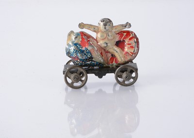 Lot 409 - A Japanese Penny Toy of Momotaro (Peach Boy)