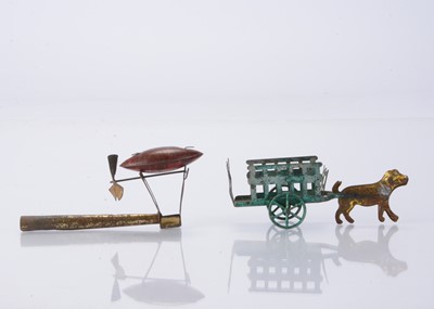 Lot 438 - French Penny Toys dog cart and whistle