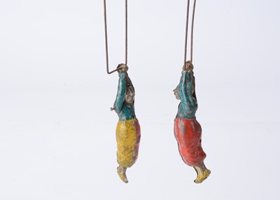 Lot 439 - Two tinplate clown acrobats