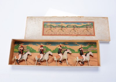 Lot 447 - A Japanese boxed set of gofun cavalry soldiers