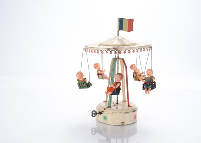 Lot 451 - A Jouet Magnin Lyon (JML - France) painted tinplate carousel