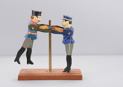 Lot 458 - An Albin Amende Sonneberg Russian and Japanese wresting toy, circa 1905