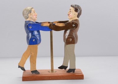 Lot 461 - An Albin Amende Sonneberg USA Presidential wresting toy, circa 1912